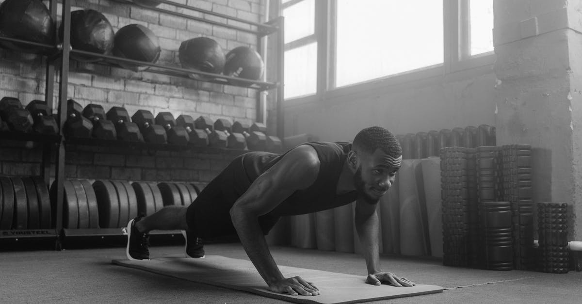 Why does melted asiago impart a strong numbing mouthfeel? - A Grayscale Photo of a Man Doing Push Ups