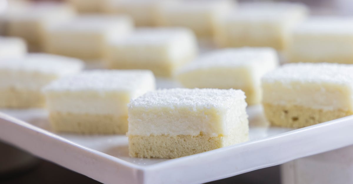 Why does my cake get hard after baking? - White and Brown Bread on White Ceramic Tray