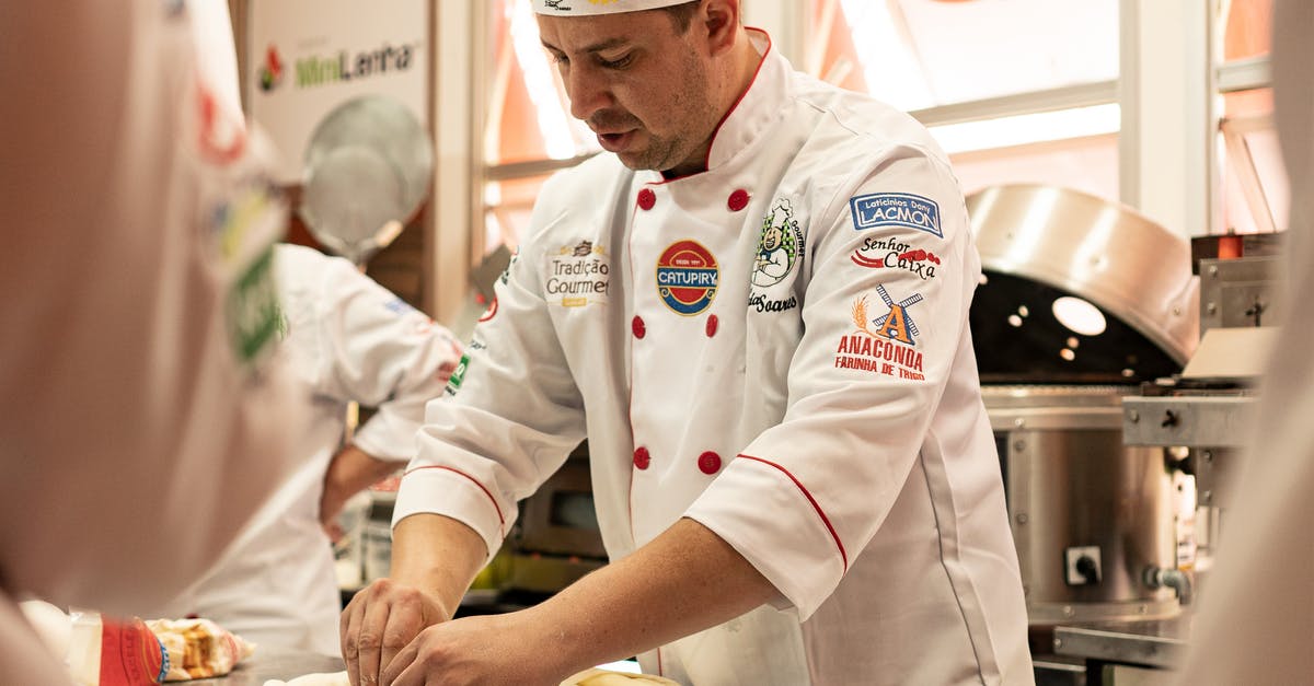 Why does my dough never "fall" after its first rise? - Man in White Chef Uniform Sitting on Chair