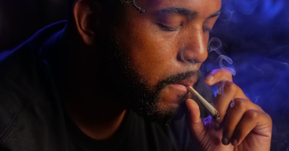 Why does pâte à choux puff up? - Close-Up Photo of Man Smoking Cigarette in Dark Room