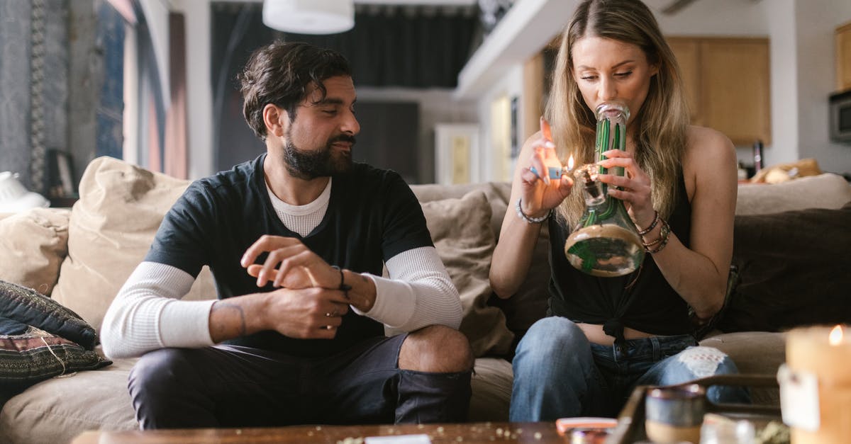 Why does pâte à choux puff up? - Man Sitting Beside a Woman Lighting Up a Bong