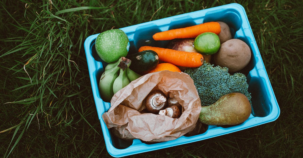 Why does steamed potatoes sometimes have a smooth, banana-like texture? - Plastic Container With Fruits and Vegetables on Green Grass