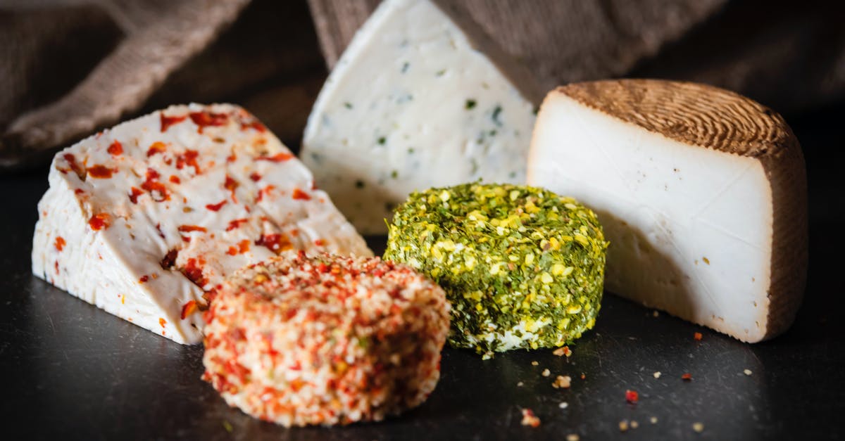 Why does string cheese taste different when pulled apart than when bitten? - Various types of cheese placed on table Why does string cheese taste different when pulled apart than when bitten? - Various types of cheese placed on table
