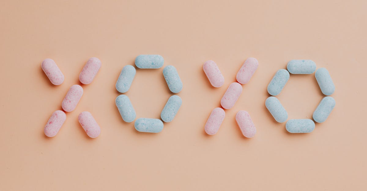 Why does string cheese taste different when pulled apart than when bitten? - Colorful candy dots on pink background Why does string cheese taste different when pulled apart than when bitten? - Colorful candy dots on pink background