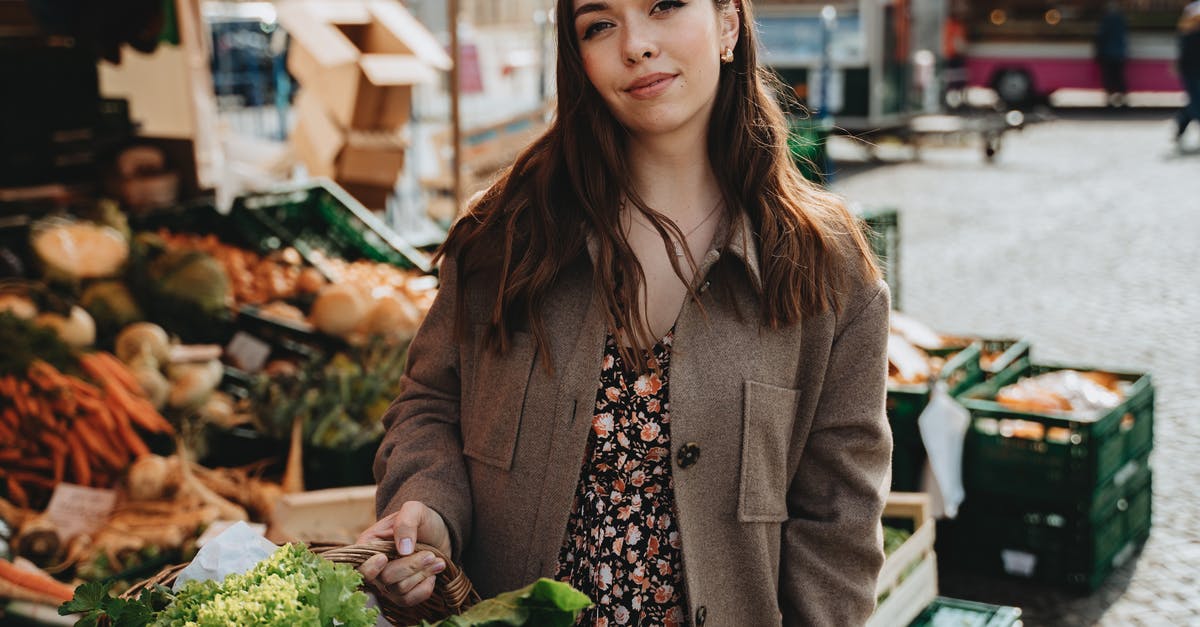 Why exactly do leafy vegetables turn to mush when frozen uncoooked? - A Woman Buying Fresh Vegetables