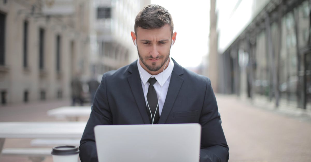 Why is my mac 'n' cheese grainy? - Man in Black Suit Jacket Using Macbook