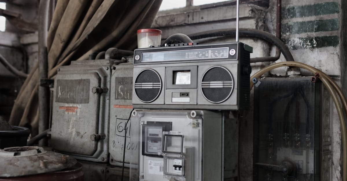 Why is the Gastronorm system based on 530 × 325mm? - Old fashioned cassette player placed in shabby garage near old industrial equipment