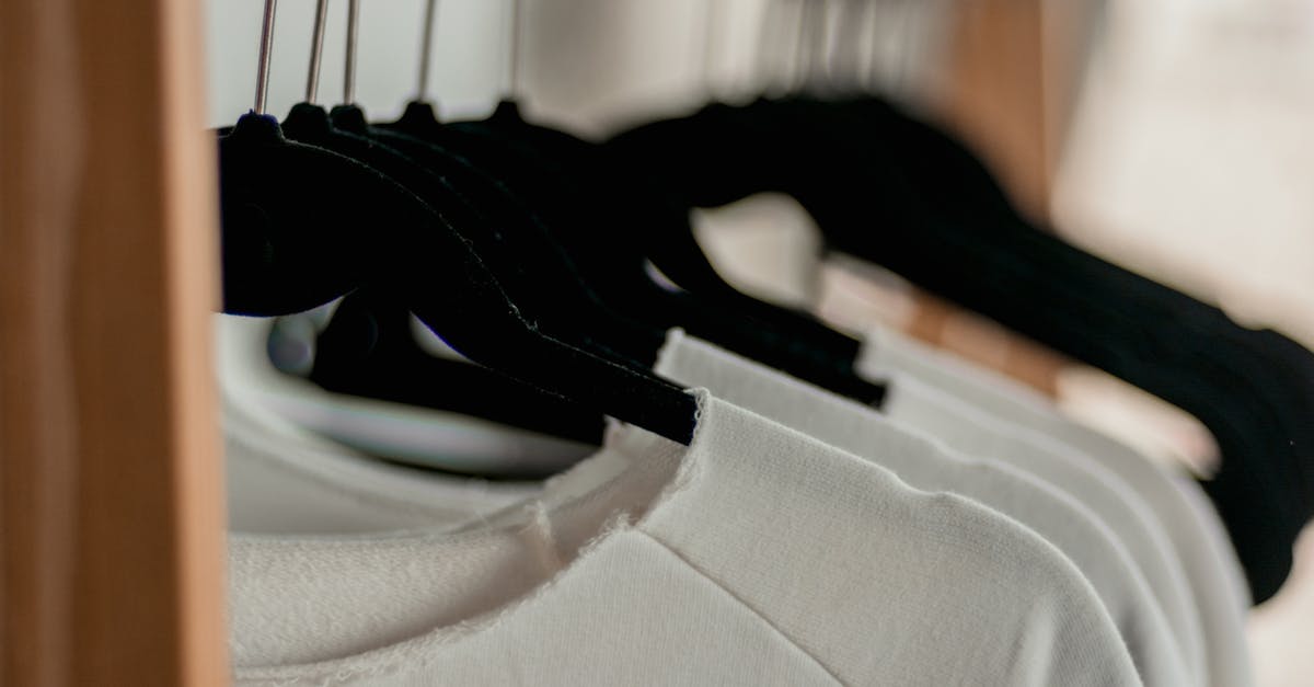 Why isn't my stock consistent - Hanged White Shirts on Black Clothes Hangers