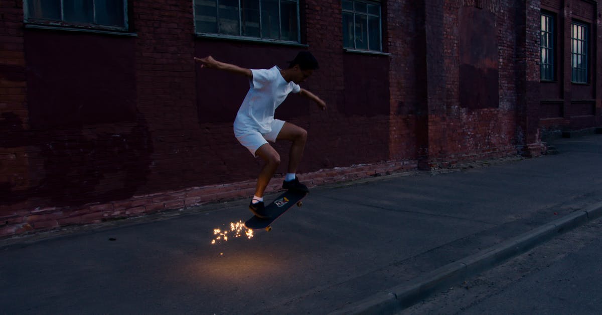 Why not air-dry knives? - Man in White T-shirt and Blue Shorts Jumping on Road