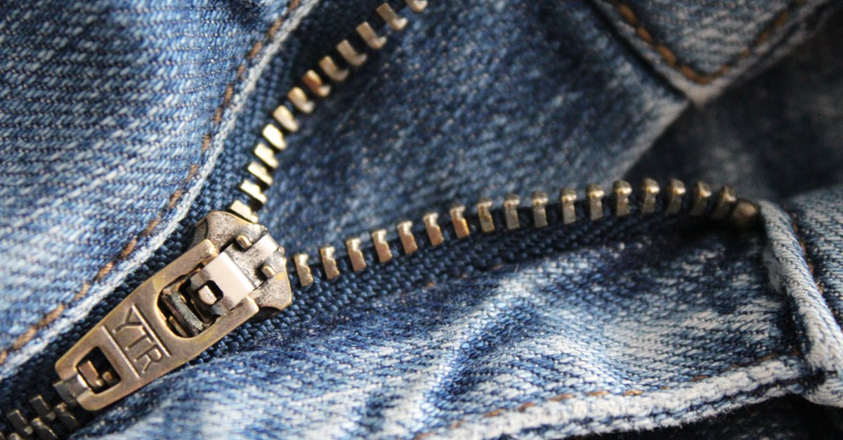 Why proof a baguette seam side up - Close Up of Zipper of Blue Denim Bottoms