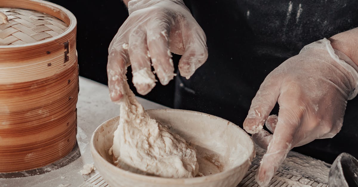 Why should I cook the flour first when making bechamel sauce? - Dough in a White Ceramic Bowl 