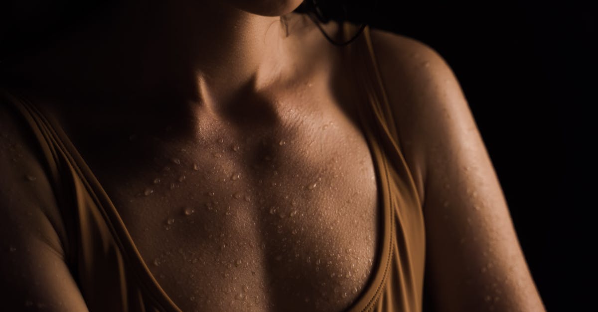 Why sweat but not brown? - Close Up Photo of Wet Chest of a Woman 