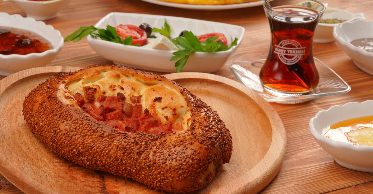 Why was our garlic butter made in France, much nicer than garlic butter in England? - Bread With Cheese and Vegetable on Brown Wooden Tray Why was our garlic butter made in France, much nicer than garlic butter in England? - Bread With Cheese and Vegetable on Brown Wooden Tray