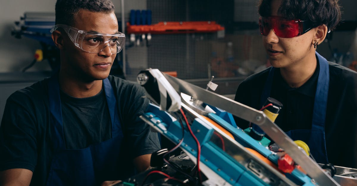 Why will my dense, concentrated stock not solidify to jelly? - Two Boys Wearing Safety Glasses Near a Metal Frame