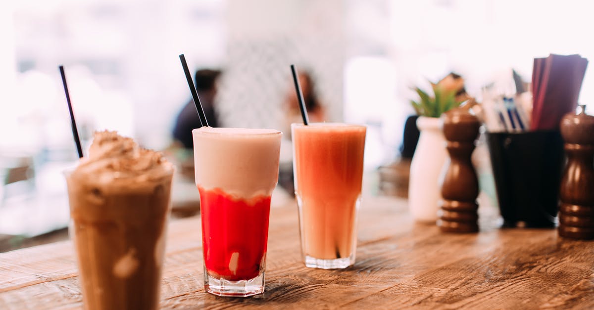 Why would dipping a cold item in chocolate "help" with tempering? - Glass of Chocolate Smoothie and Cocktail Drinks on Wooden Table