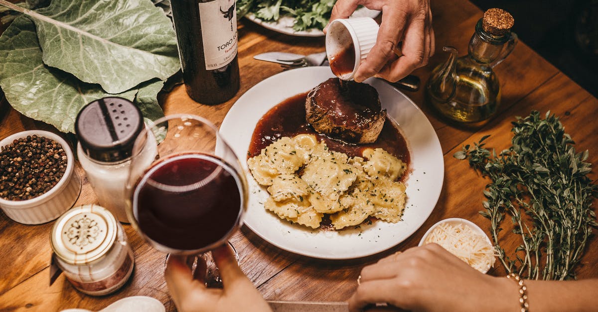 Wine selection when dining on horse meat? - Photo Of Food On Top Of Table