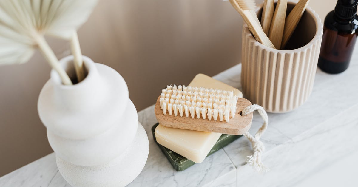 Wood versus marble rolling pin 'performance' - Set of natural toiletries on marble tabletop