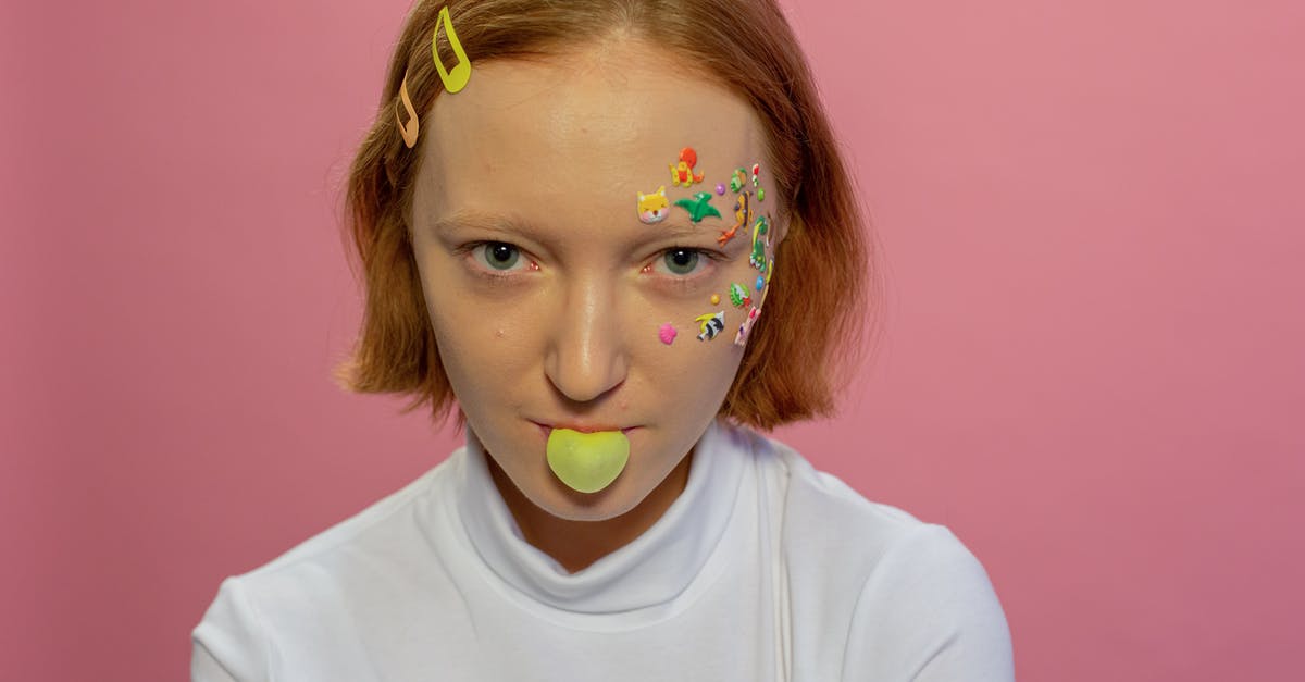 Xanthan Gum v. Guar Gum v. Cellulose Gum v. Glucomannan - Lady with animal stickers on face blowing bubble with gum