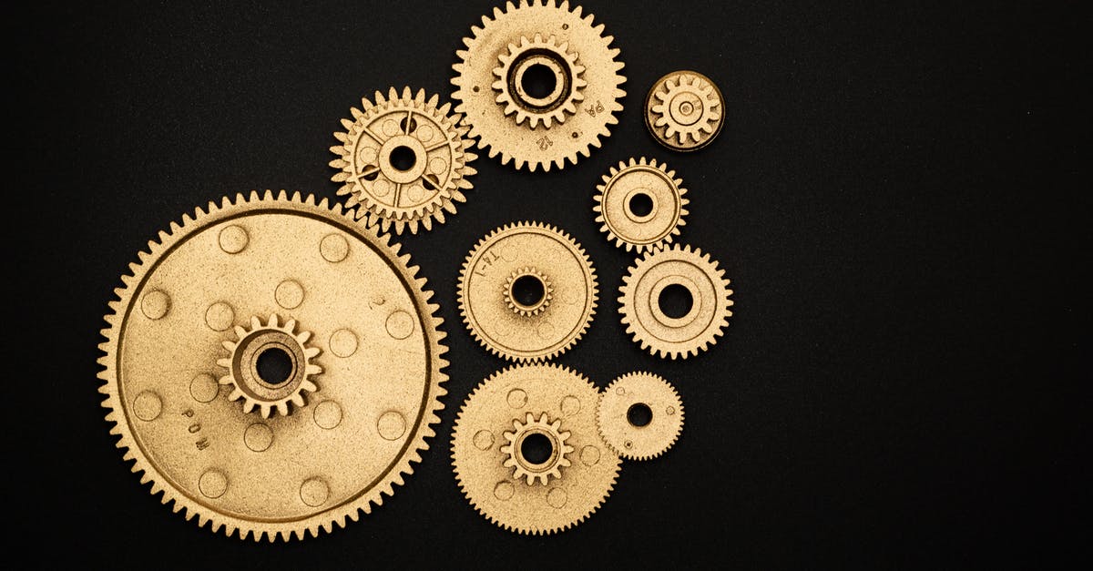 Yogurt not turning out since relocation - Photo of Golden Cogwheel on Black Background